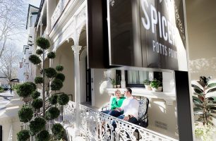 Couple on romantic weekend getaway in Sydney in luxurious Potts Point hotel