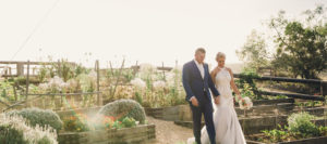 bride and groom in garden at spicers hidden vale