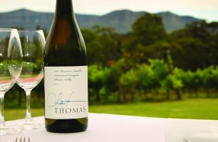 Table set with wine, outdoor dining at Spicers Vineyards Estate